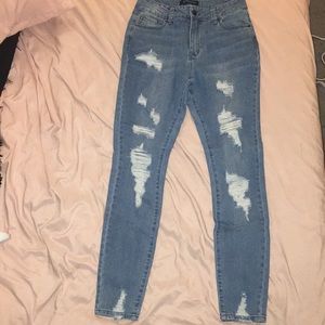 Never worn Blue Spice Distressed jeans